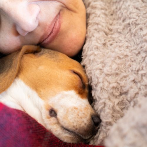 woman bonding with her dog